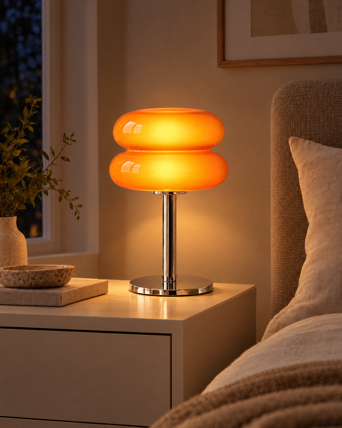 Rivella Glass Table Lamp switched on at night