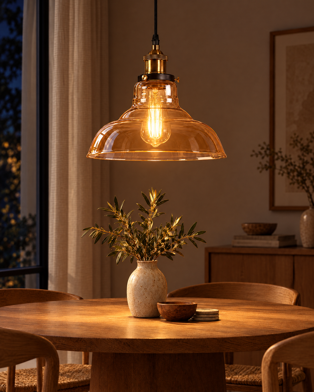 Ambriva Amber Glass Pendant Light switched on at night