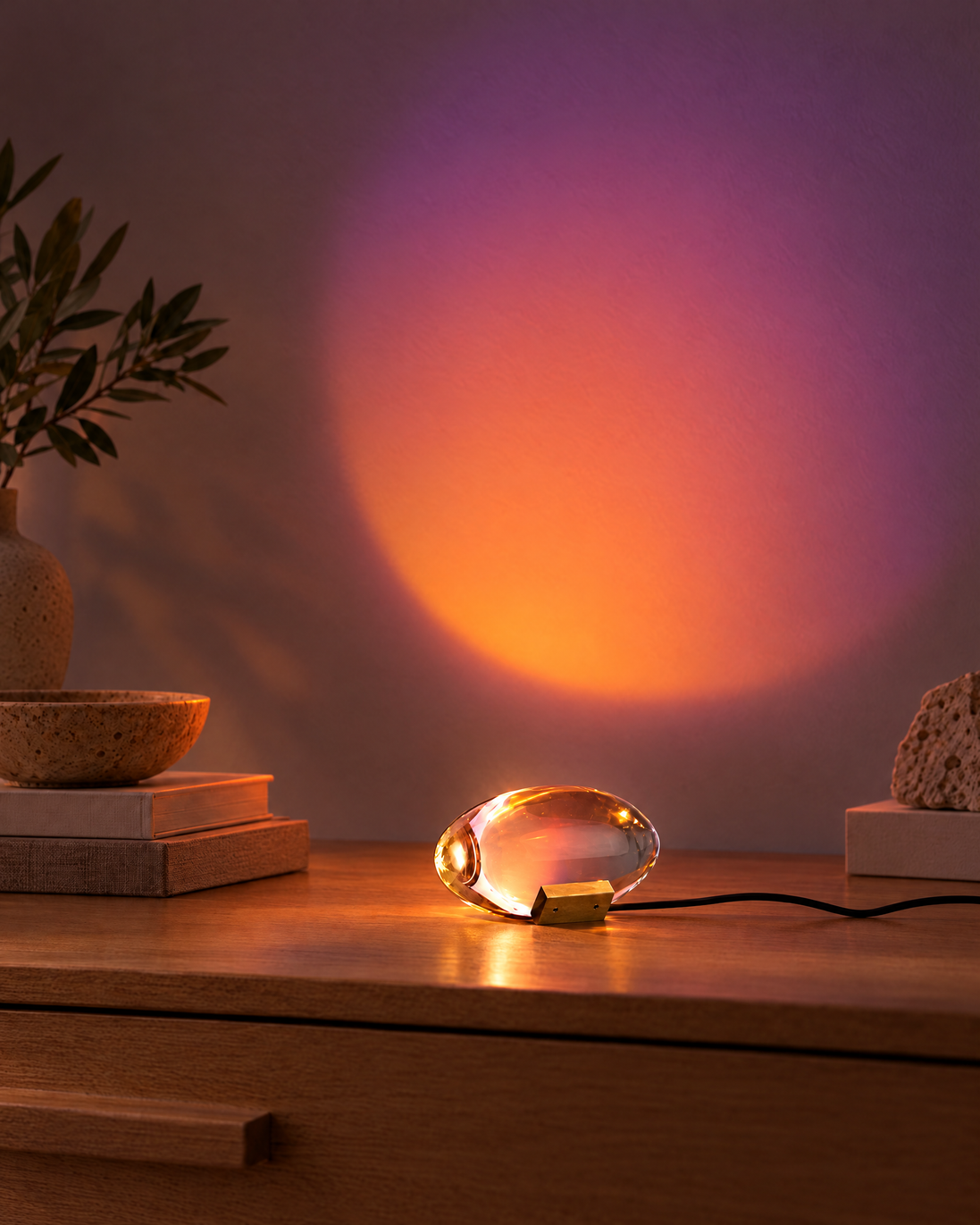 Auravik Ambient Light Projector switched on at night