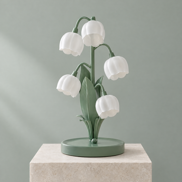Muguet lily of the valley table lamp with five frosted white bell shades and sage green leaves