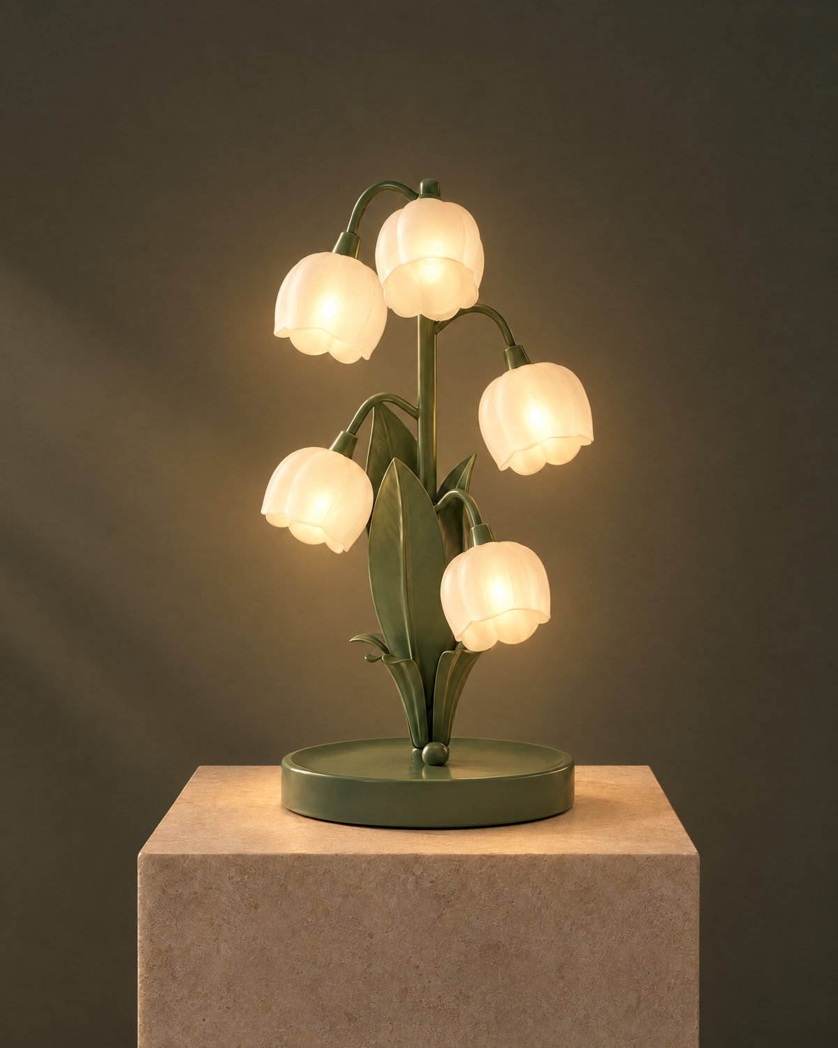 Muguet lily of the valley lamp switched on, five bell shades glowing warm